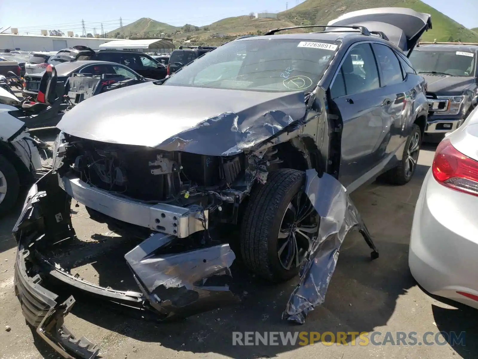 2 Photograph of a damaged car 2T2BZMCA5KC168201 LEXUS RX350 2019