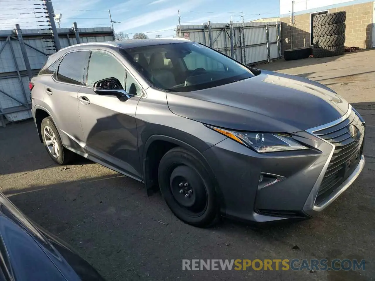 4 Photograph of a damaged car 2T2BZMCAXKC174303 LEXUS RX350 2019