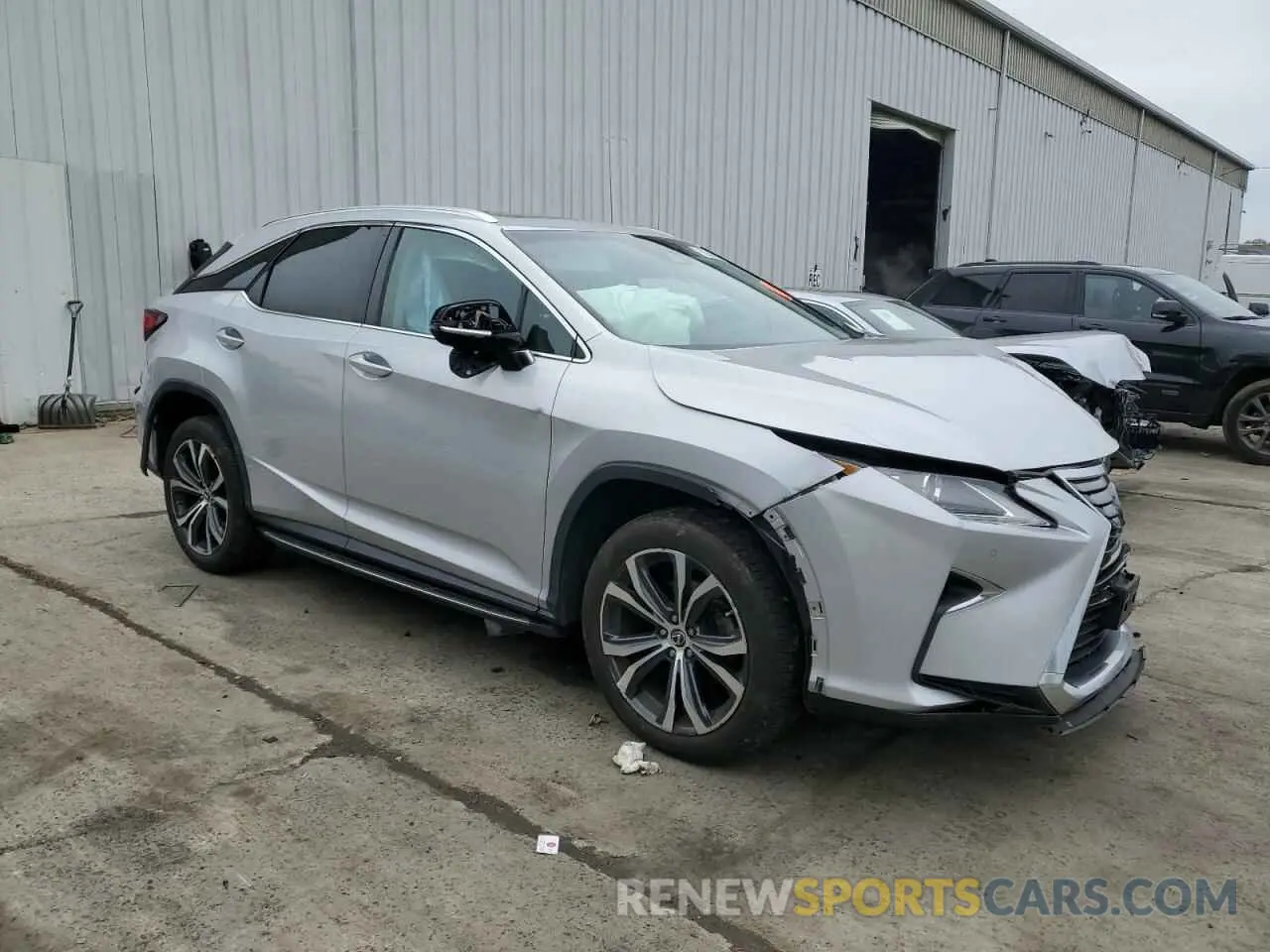 4 Photograph of a damaged car 2T2BZMCAXKC197225 LEXUS RX350 2019