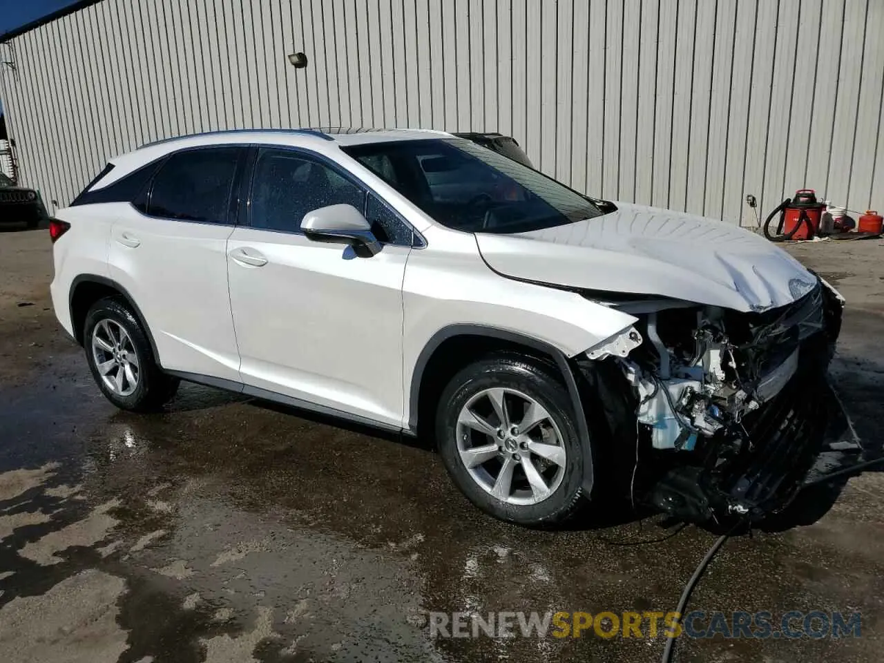 4 Photograph of a damaged car 2T2BZMCAXKC199525 LEXUS RX350 2019