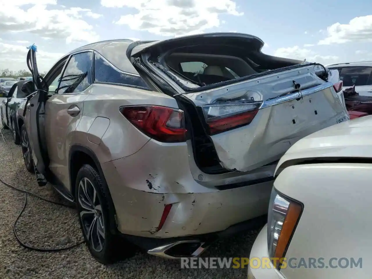 3 Photograph of a damaged car 2T2ZZMCA1KC128597 LEXUS RX350 2019