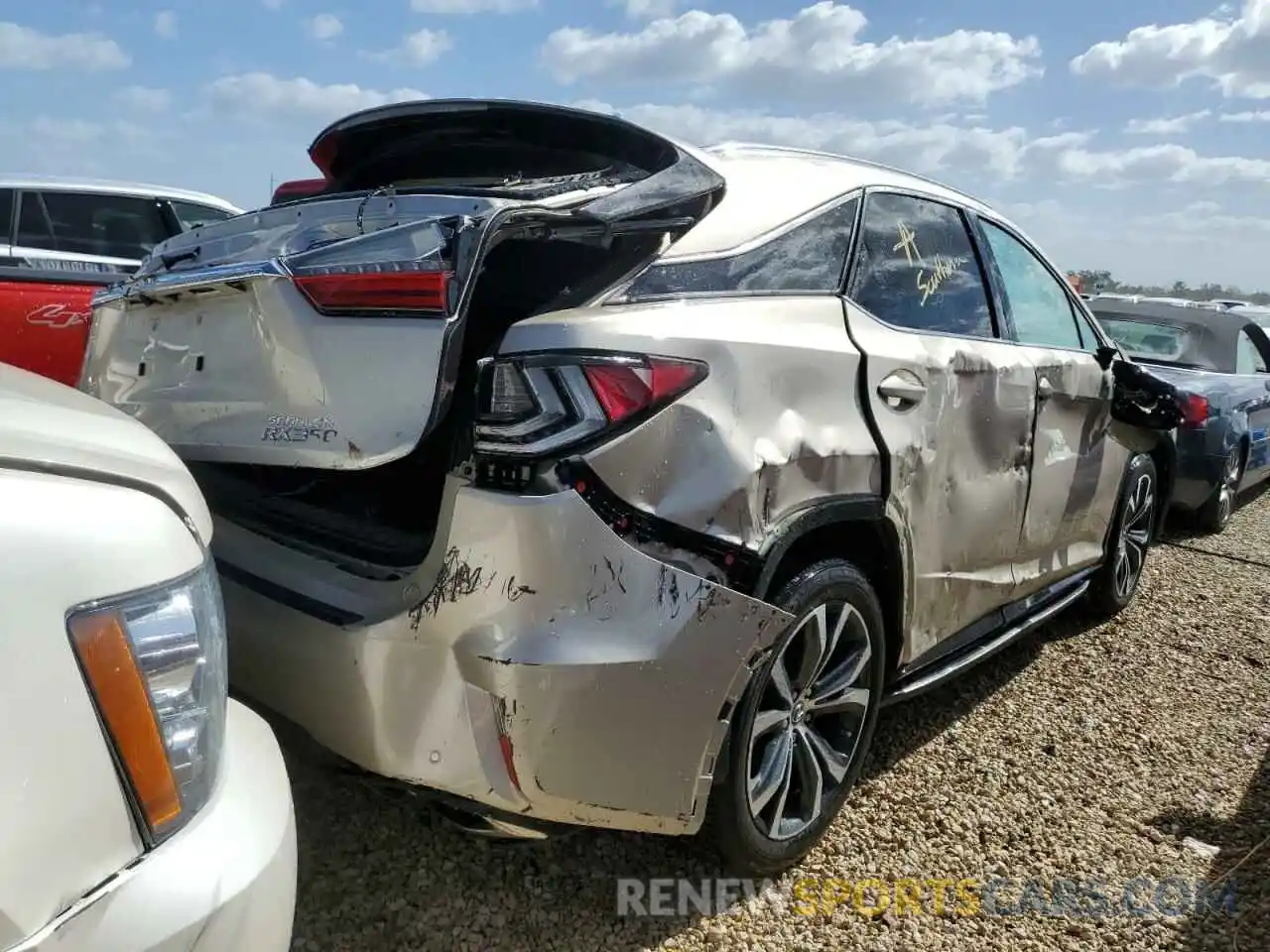 4 Photograph of a damaged car 2T2ZZMCA1KC128597 LEXUS RX350 2019