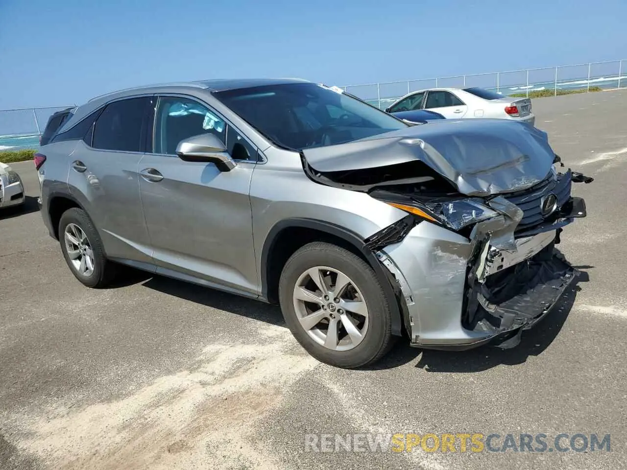 4 Photograph of a damaged car 2T2ZZMCA1KC139583 LEXUS RX350 2019