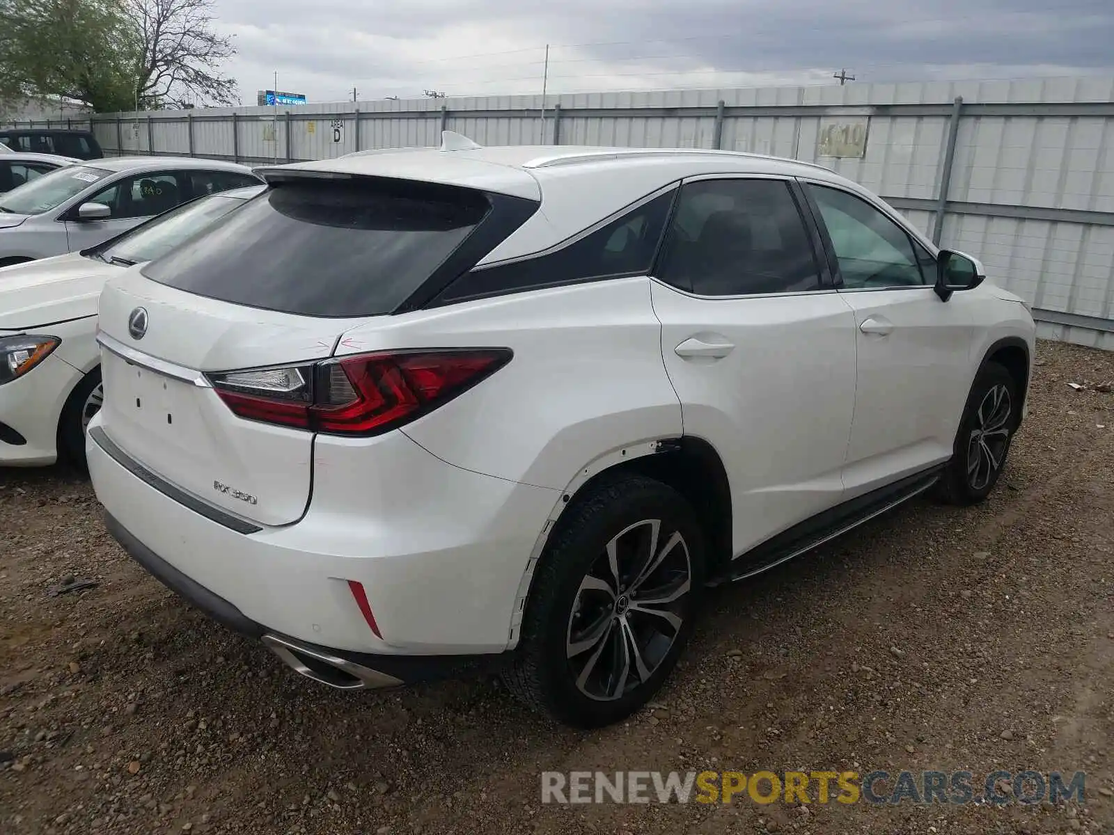 4 Photograph of a damaged car 2T2ZZMCA3KC125300 LEXUS RX350 2019