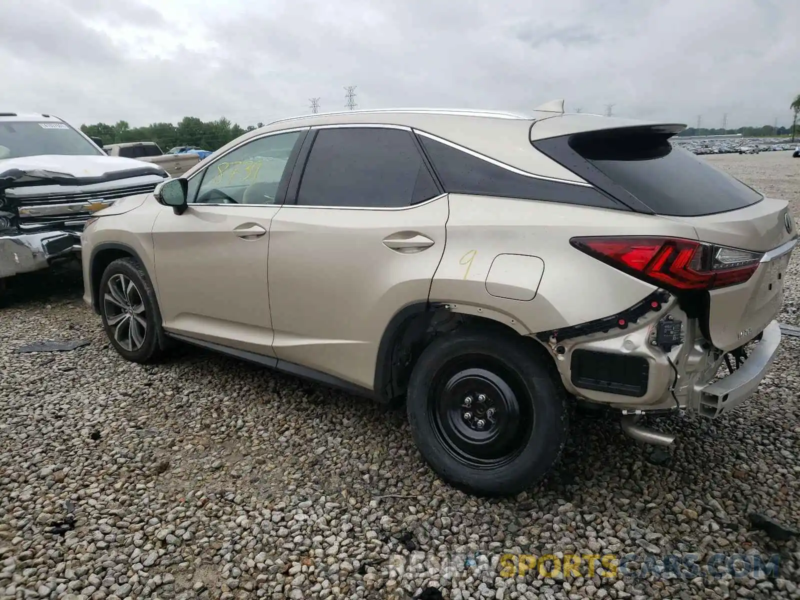 3 Photograph of a damaged car 2T2ZZMCA3KC125510 LEXUS RX350 2019