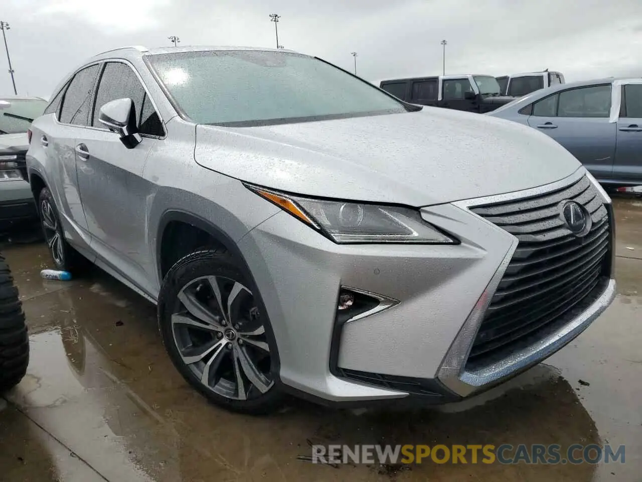 4 Photograph of a damaged car 2T2ZZMCA3KC134286 LEXUS RX350 2019
