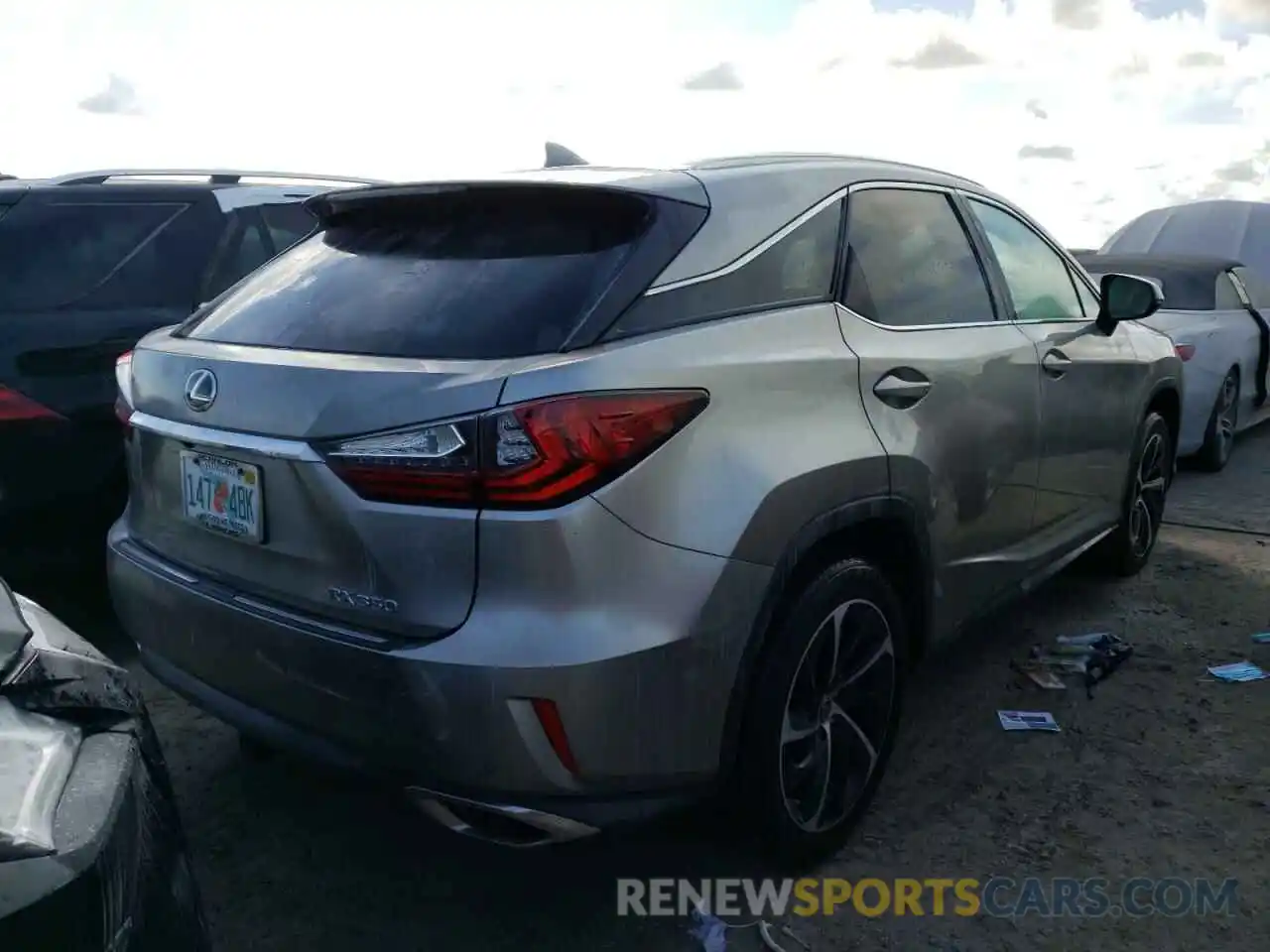 4 Photograph of a damaged car 2T2ZZMCA3KC138743 LEXUS RX350 2019