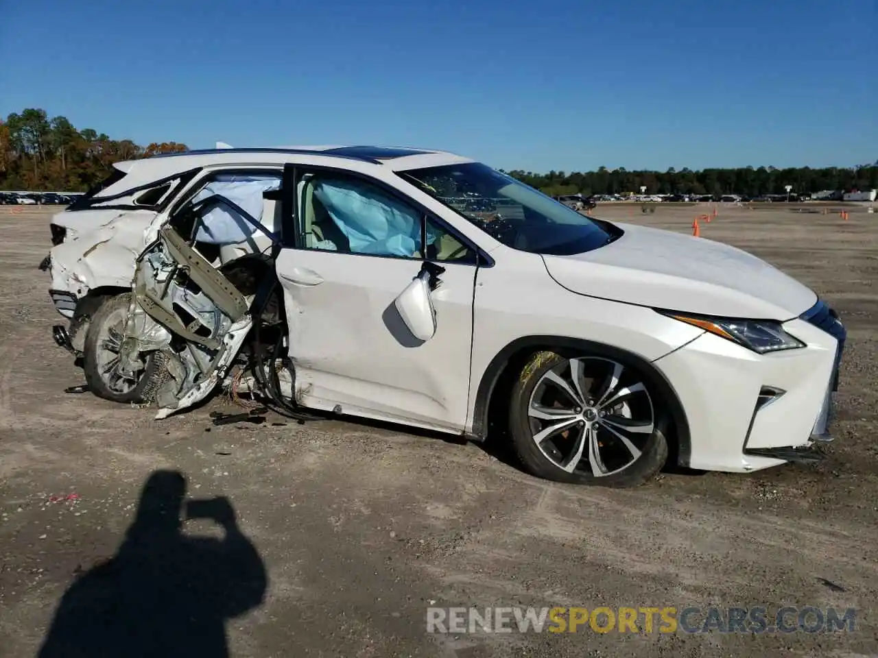 4 Photograph of a damaged car 2T2ZZMCA4KC130151 LEXUS RX350 2019