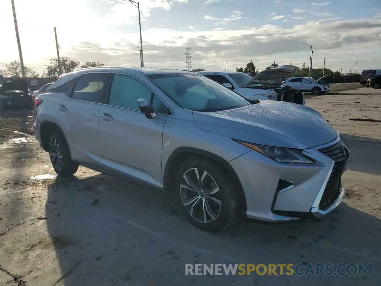 4 Photograph of a damaged car 2T2ZZMCA5KC122480 LEXUS RX350 2019