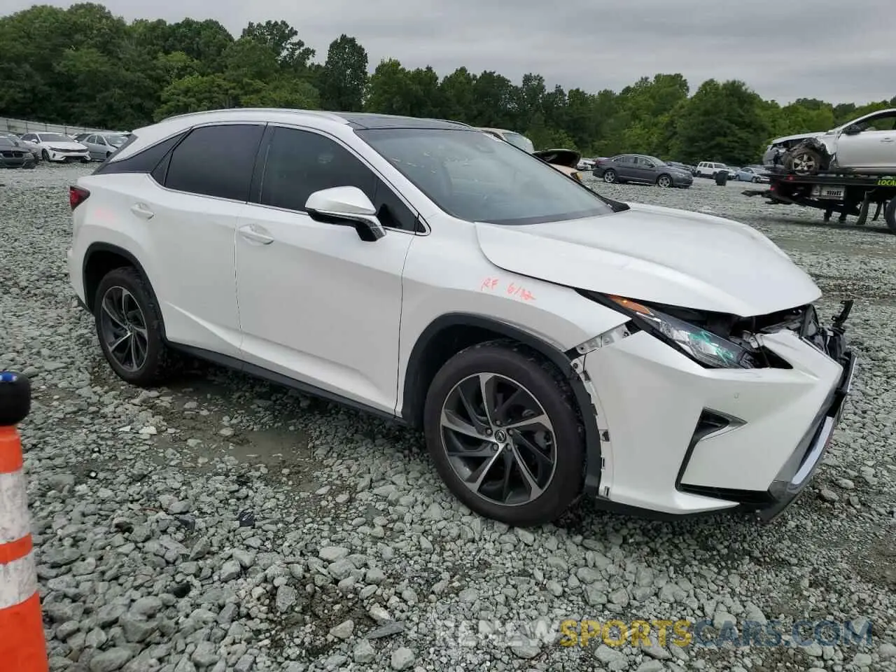 4 Photograph of a damaged car 2T2ZZMCA5KC126223 LEXUS RX350 2019