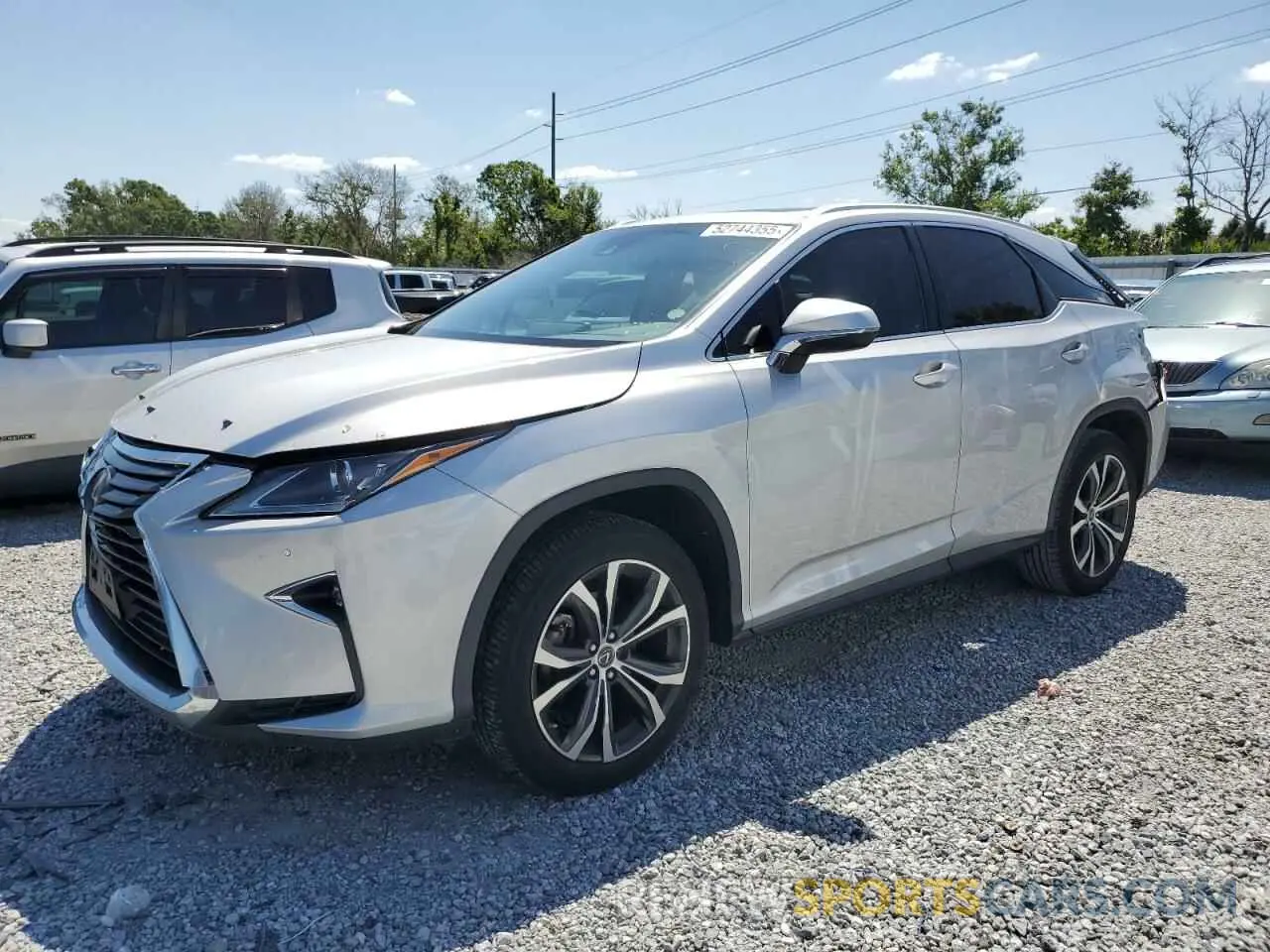 1 Photograph of a damaged car 2T2ZZMCA6KC123962 LEXUS RX350 2019