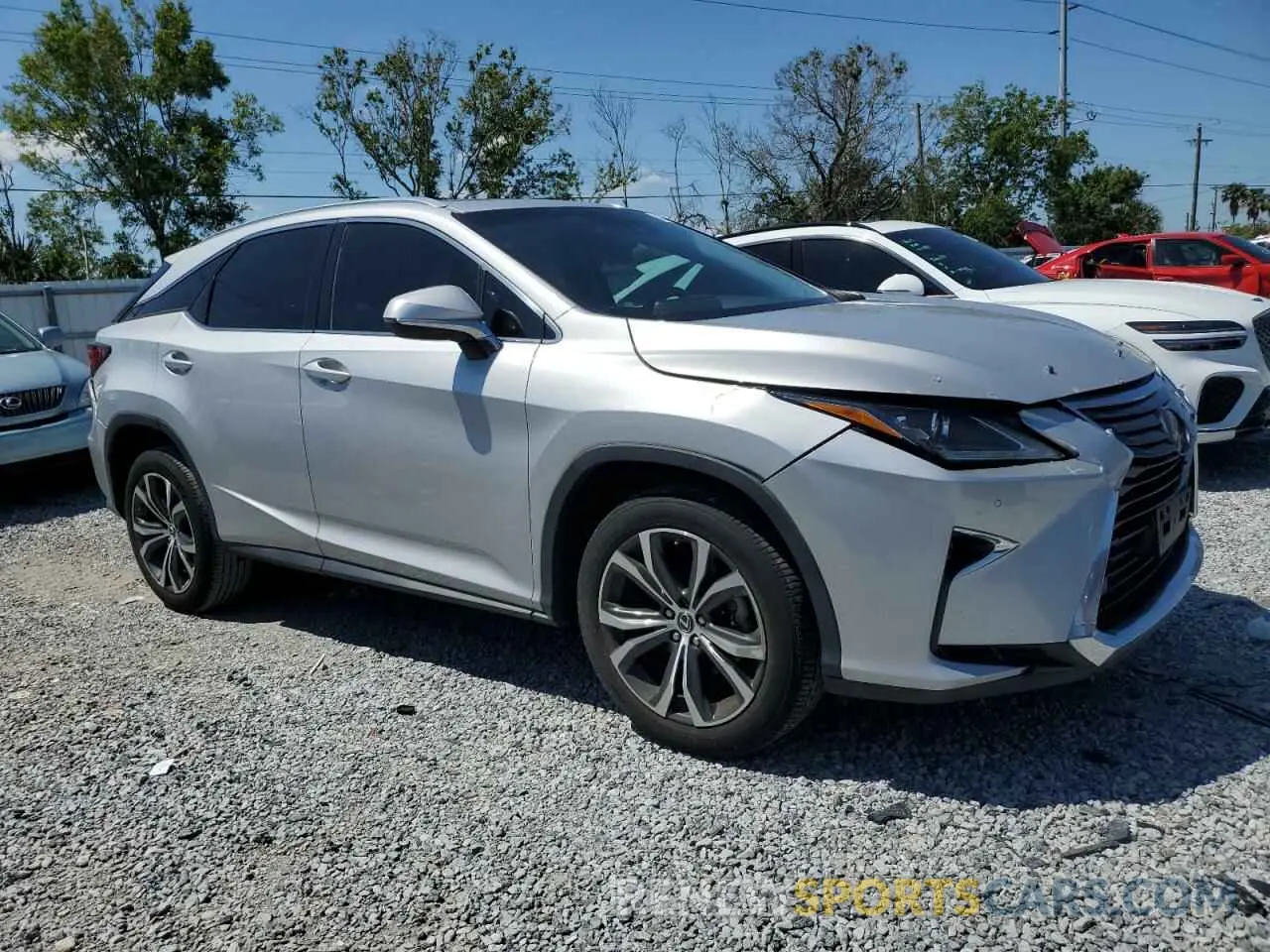 4 Photograph of a damaged car 2T2ZZMCA6KC123962 LEXUS RX350 2019