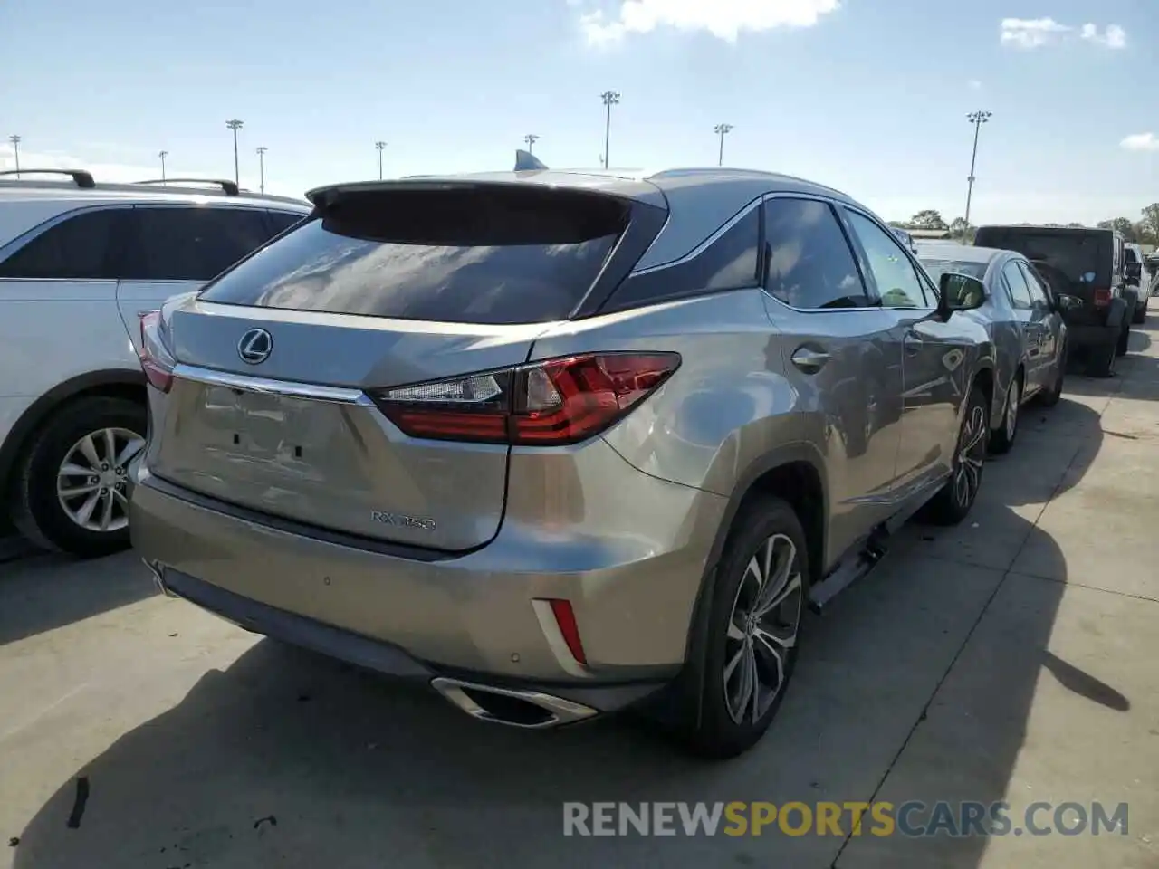 4 Photograph of a damaged car 2T2ZZMCA6KC126912 LEXUS RX350 2019