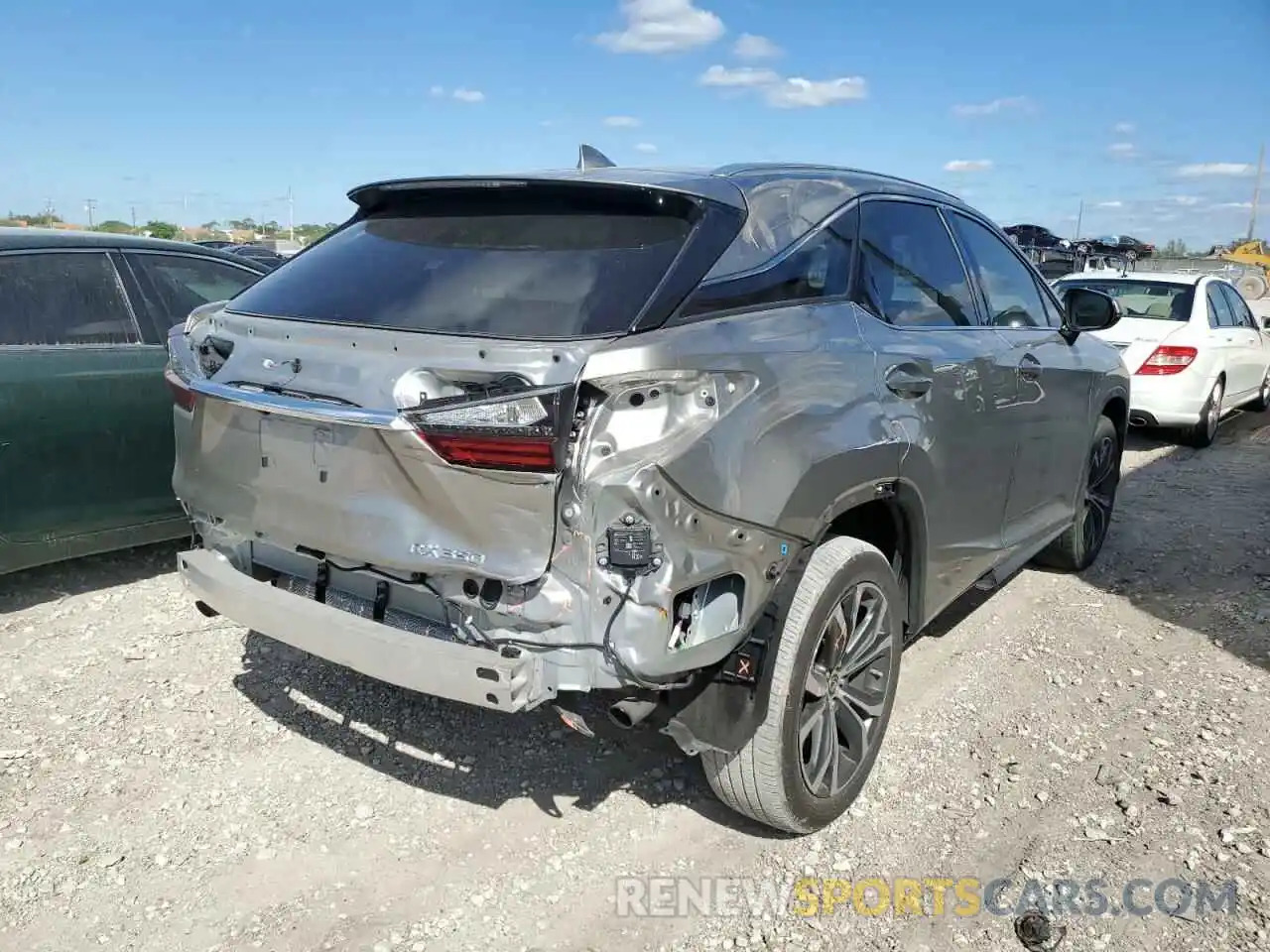 4 Photograph of a damaged car 2T2ZZMCA6KC138221 LEXUS RX350 2019