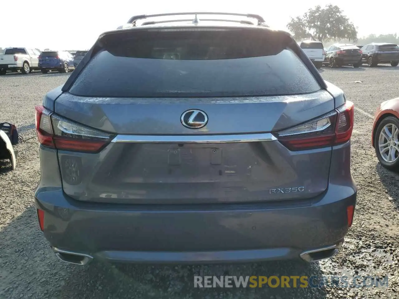 6 Photograph of a damaged car 2T2ZZMCA7KC118401 LEXUS RX350 2019