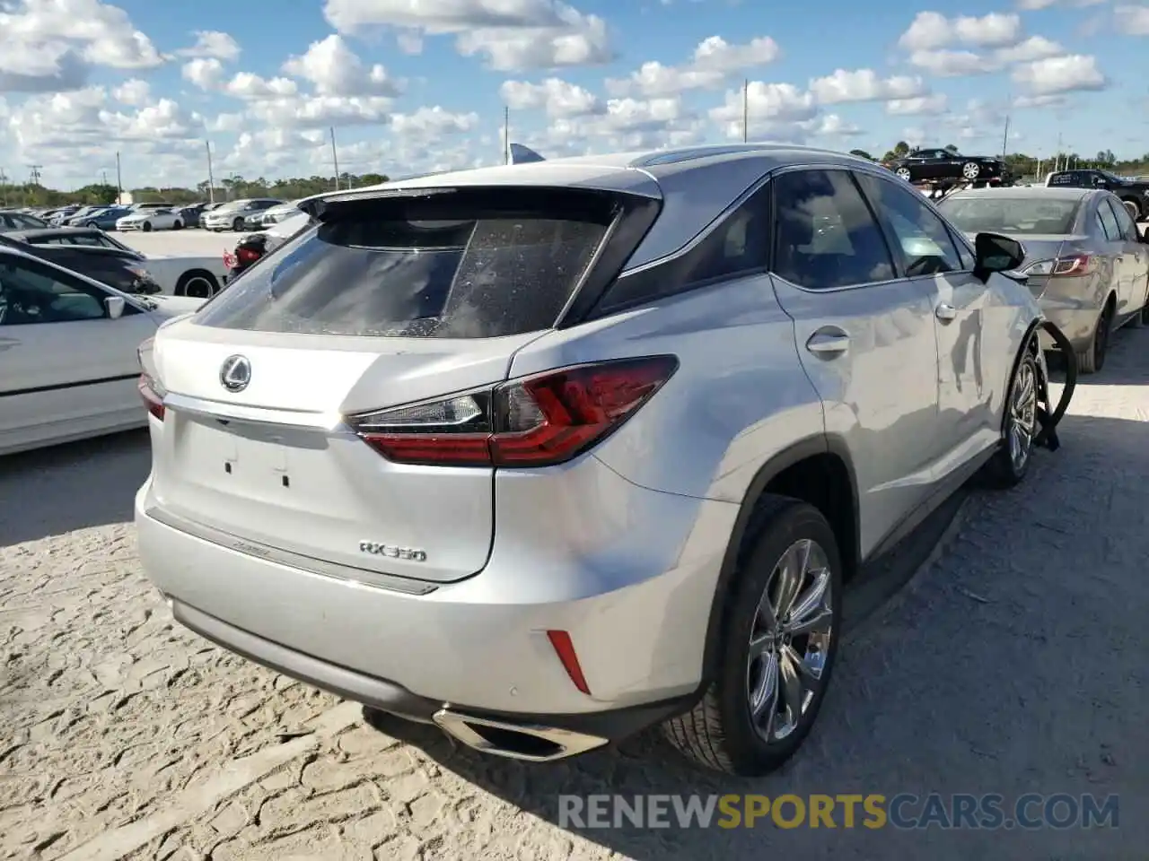 4 Photograph of a damaged car 2T2ZZMCA7KC132492 LEXUS RX350 2019