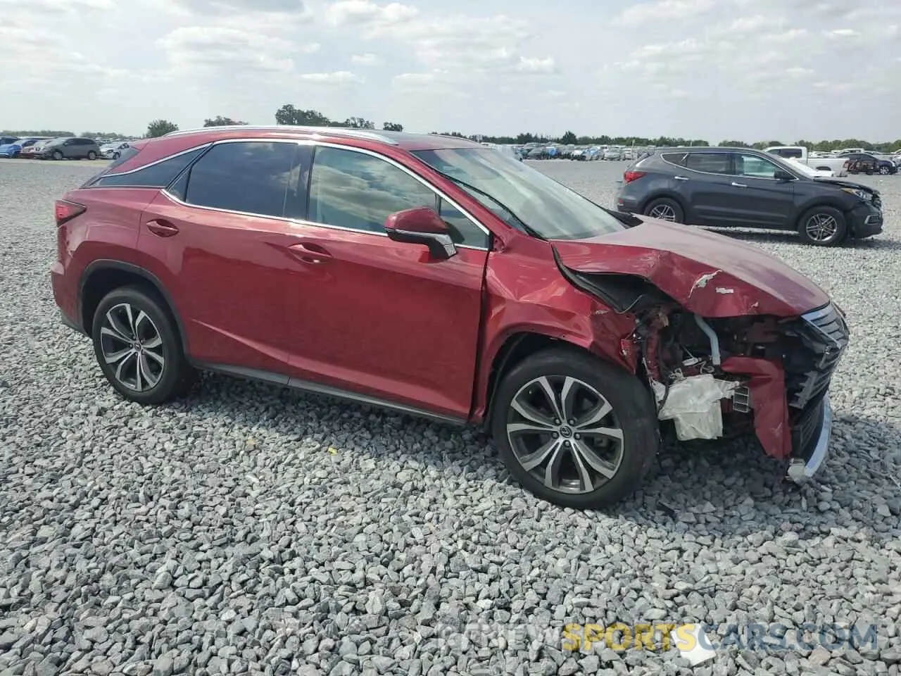 4 Photograph of a damaged car 2T2ZZMCA8KC127463 LEXUS RX350 2019