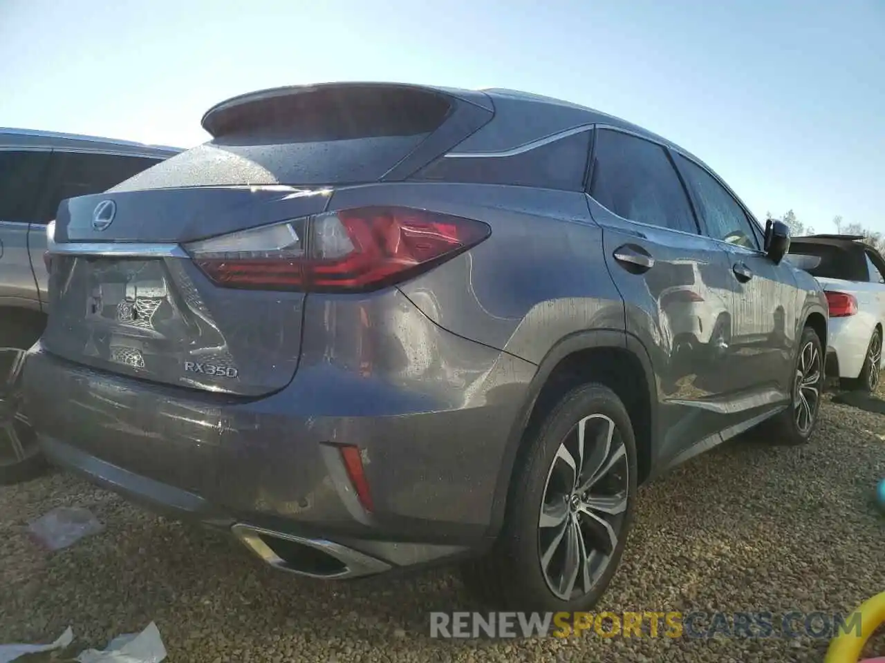 4 Photograph of a damaged car 2T2ZZMCA8KC130878 LEXUS RX350 2019