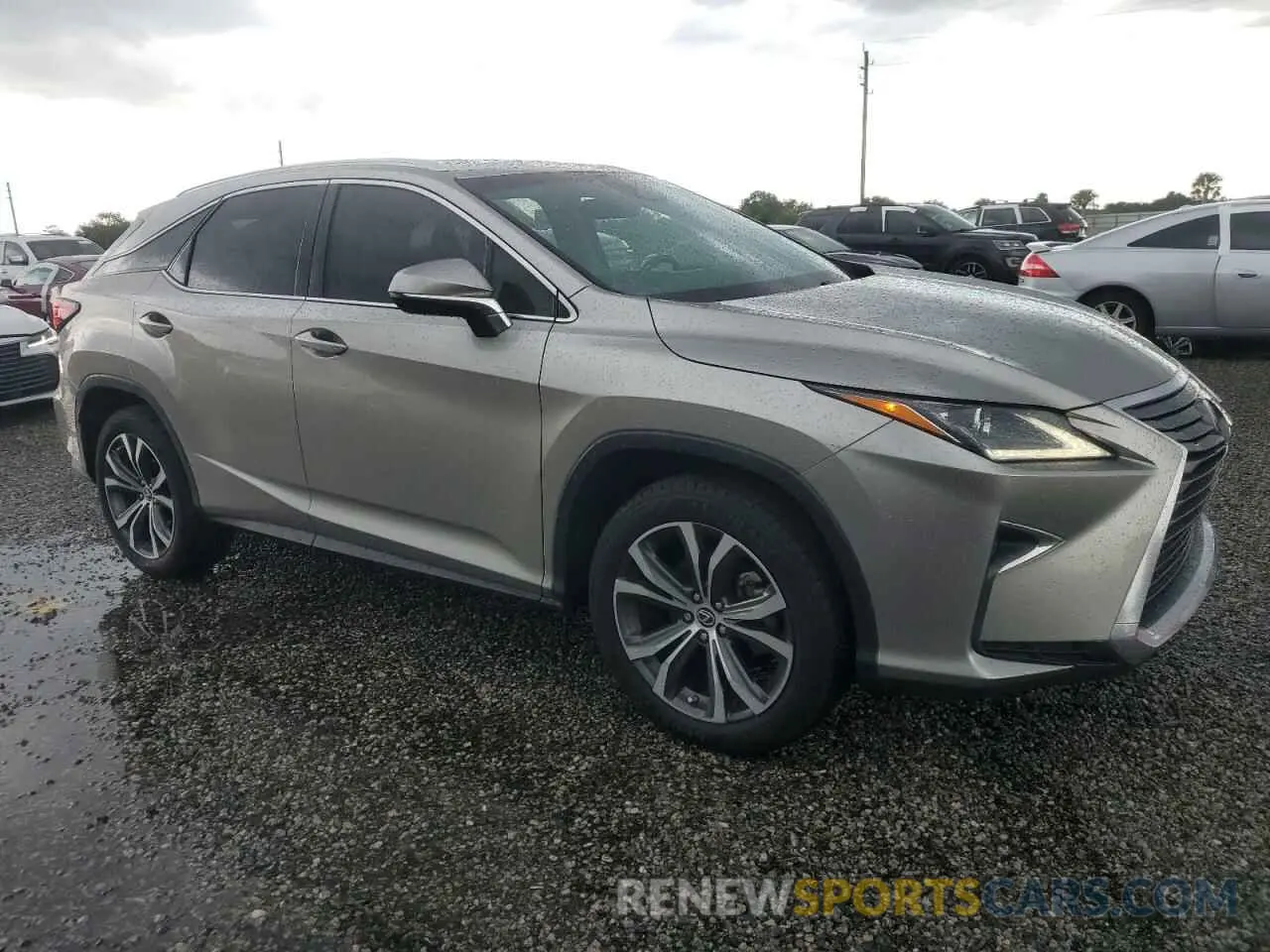 4 Photograph of a damaged car 2T2ZZMCA8KC133960 LEXUS RX350 2019