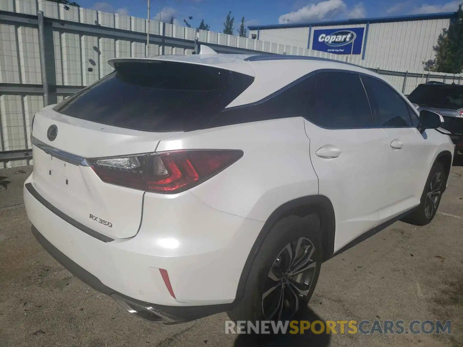 4 Photograph of a damaged car 2T2ZZMCA8KC139399 LEXUS RX350 2019