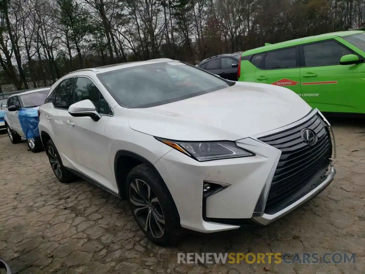 4 Photograph of a damaged car 2T2ZZMCA9KC120523 LEXUS RX350 2019