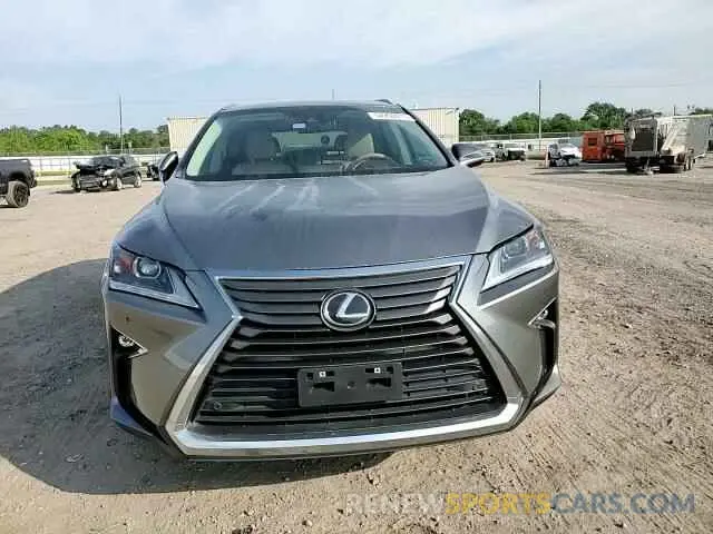 11 Photograph of a damaged car 2T2ZZMCA9KC129707 LEXUS RX350 2019