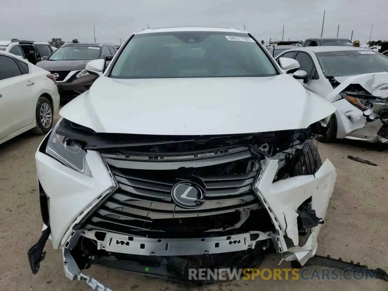 5 Photograph of a damaged car 2T2ZZMCA9KC134311 LEXUS RX350 2019