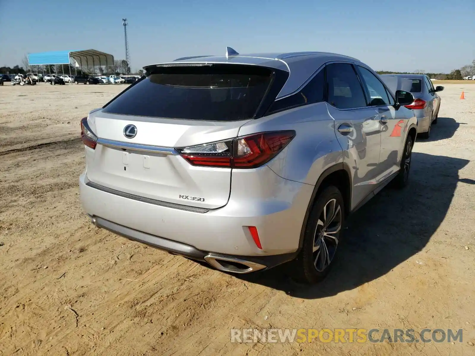 4 Photograph of a damaged car 2T2ZZMCAXKC127531 LEXUS RX350 2019