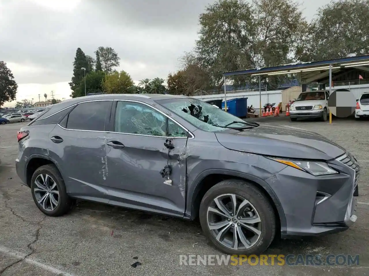 4 Photograph of a damaged car 2T2ZZMCAXKC131479 LEXUS RX350 2019