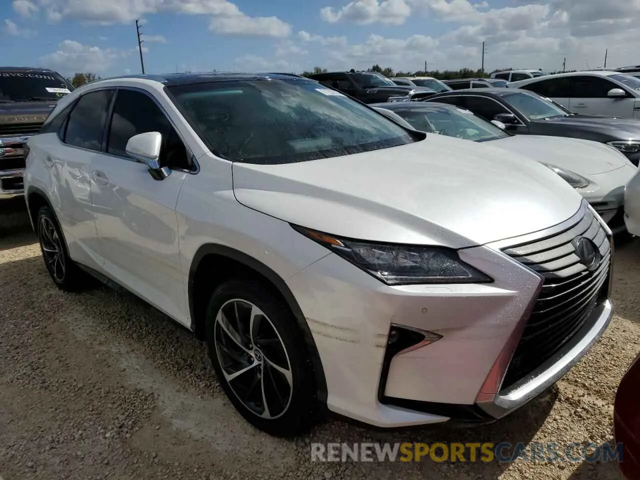 4 Photograph of a damaged car 2T2ZZMCAXKC142319 LEXUS RX350 2019