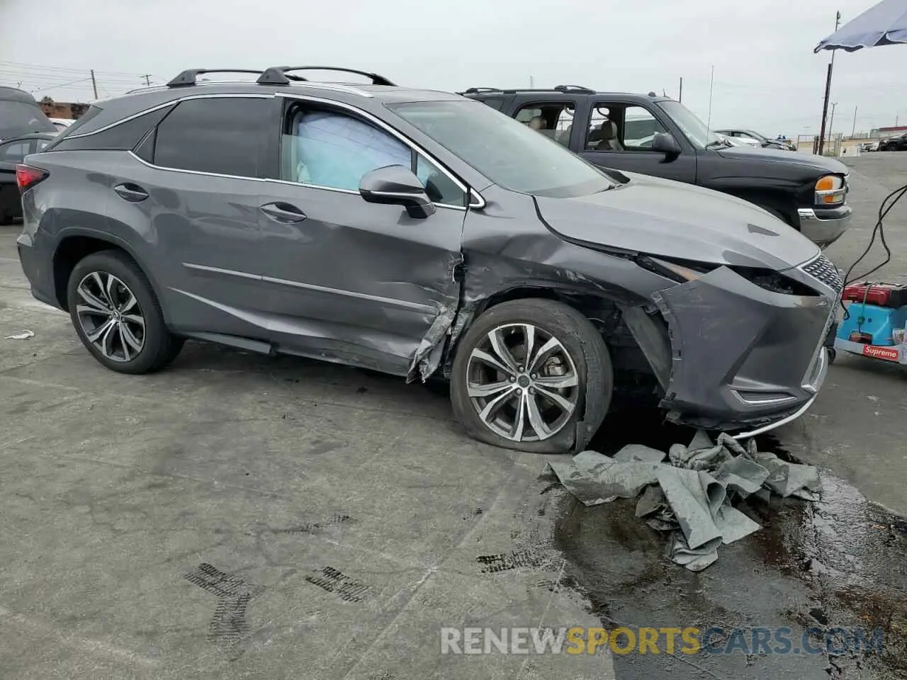 4 Photograph of a damaged car 2T2HZMAA0LC169657 LEXUS RX350 2020