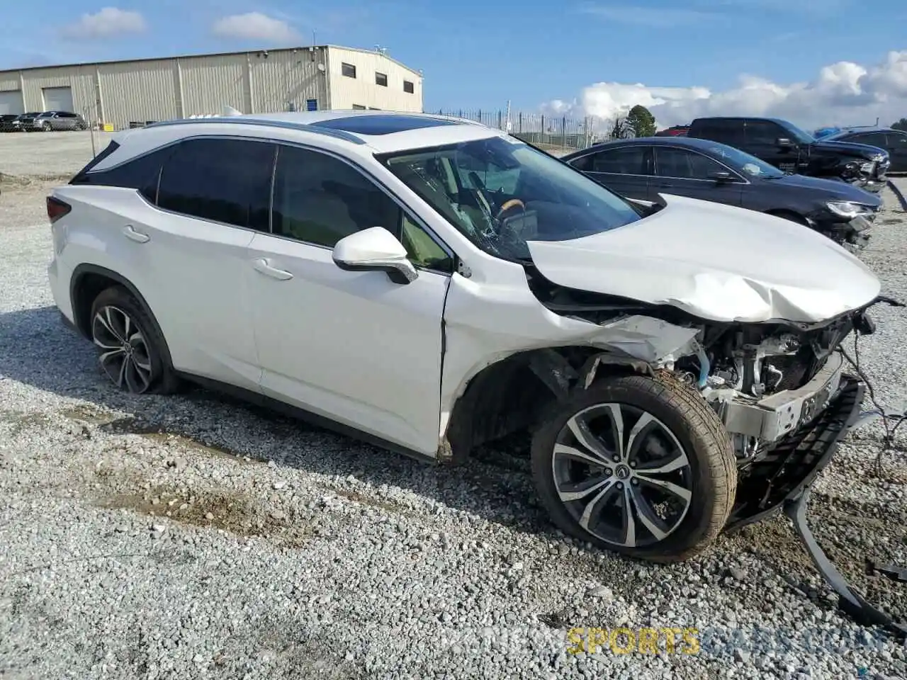 4 Photograph of a damaged car 2T2HZMAAXLC154244 LEXUS RX350 2020