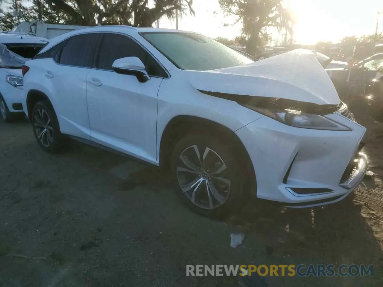 4 Photograph of a damaged car 2T2HZMAAXLC162313 LEXUS RX350 2020