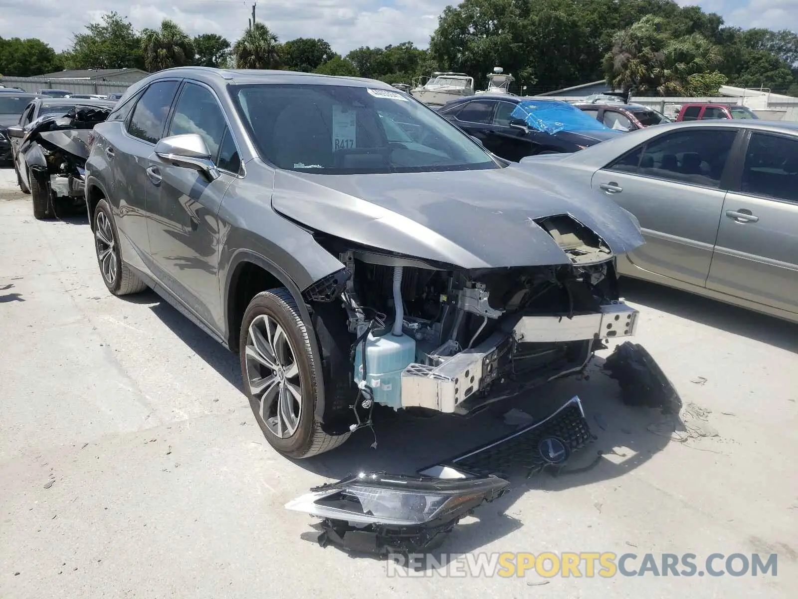 1 Photograph of a damaged car 2T2HZMAAXLC174624 LEXUS RX350 2020