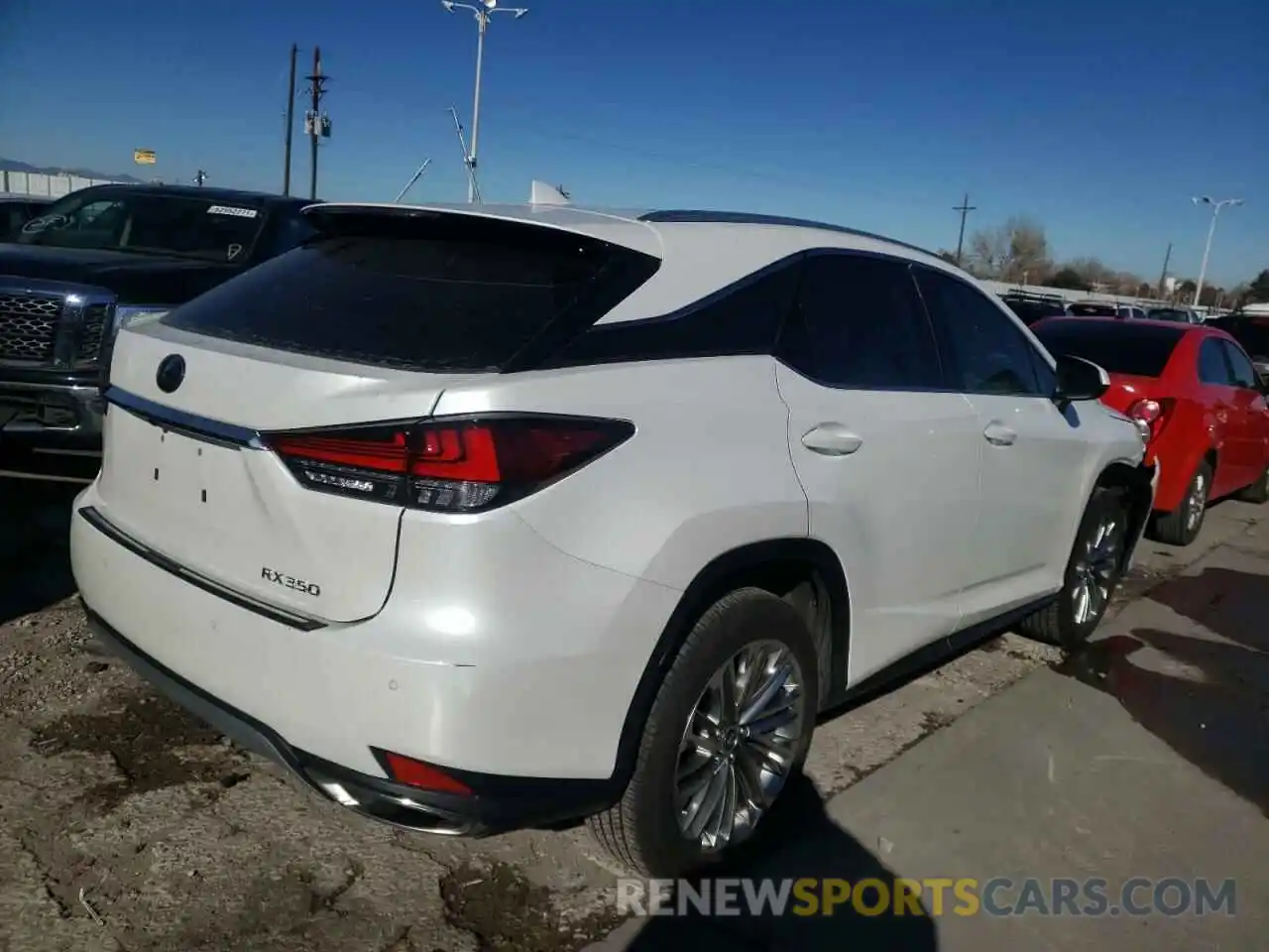 4 Photograph of a damaged car 2T2JZMDA3LC228813 LEXUS RX350 2020