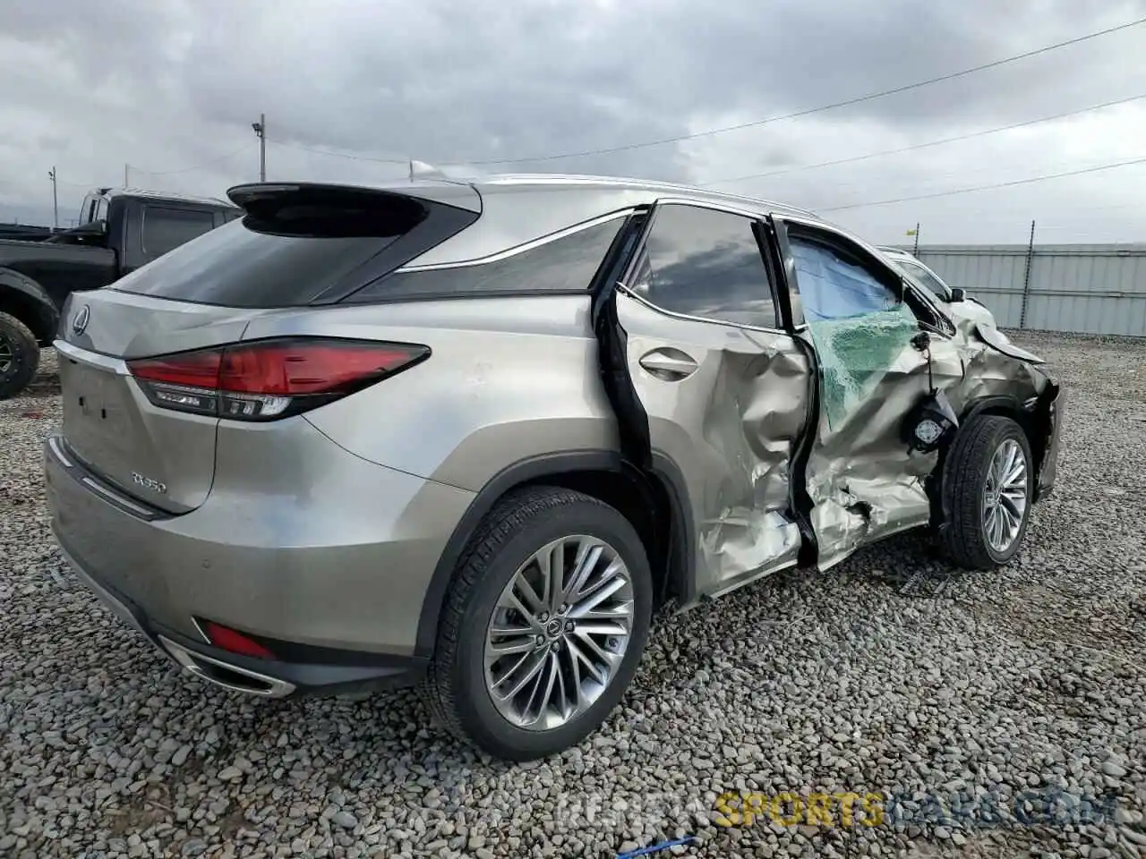 3 Photograph of a damaged car 2T2JZMDA5LC232085 LEXUS RX350 2020