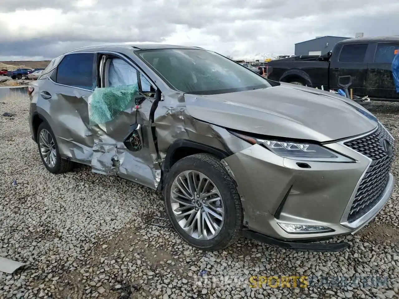 4 Photograph of a damaged car 2T2JZMDA5LC232085 LEXUS RX350 2020