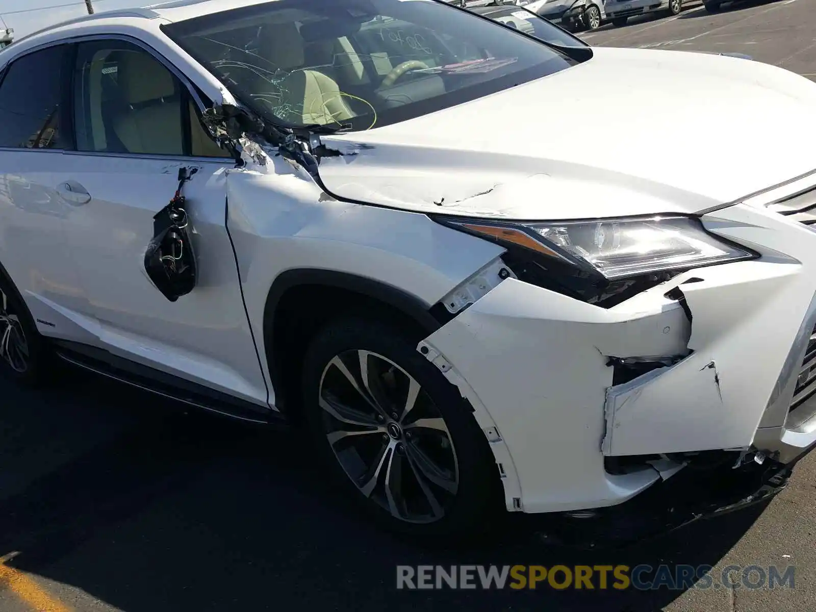 9 Photograph of a damaged car 2T2BGMCA0KC031074 LEXUS RX450 2019