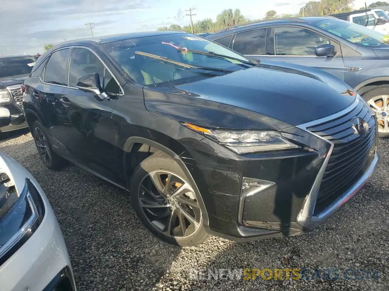 4 Photograph of a damaged car 2T2BGMCA4KC041381 LEXUS RX450 2019