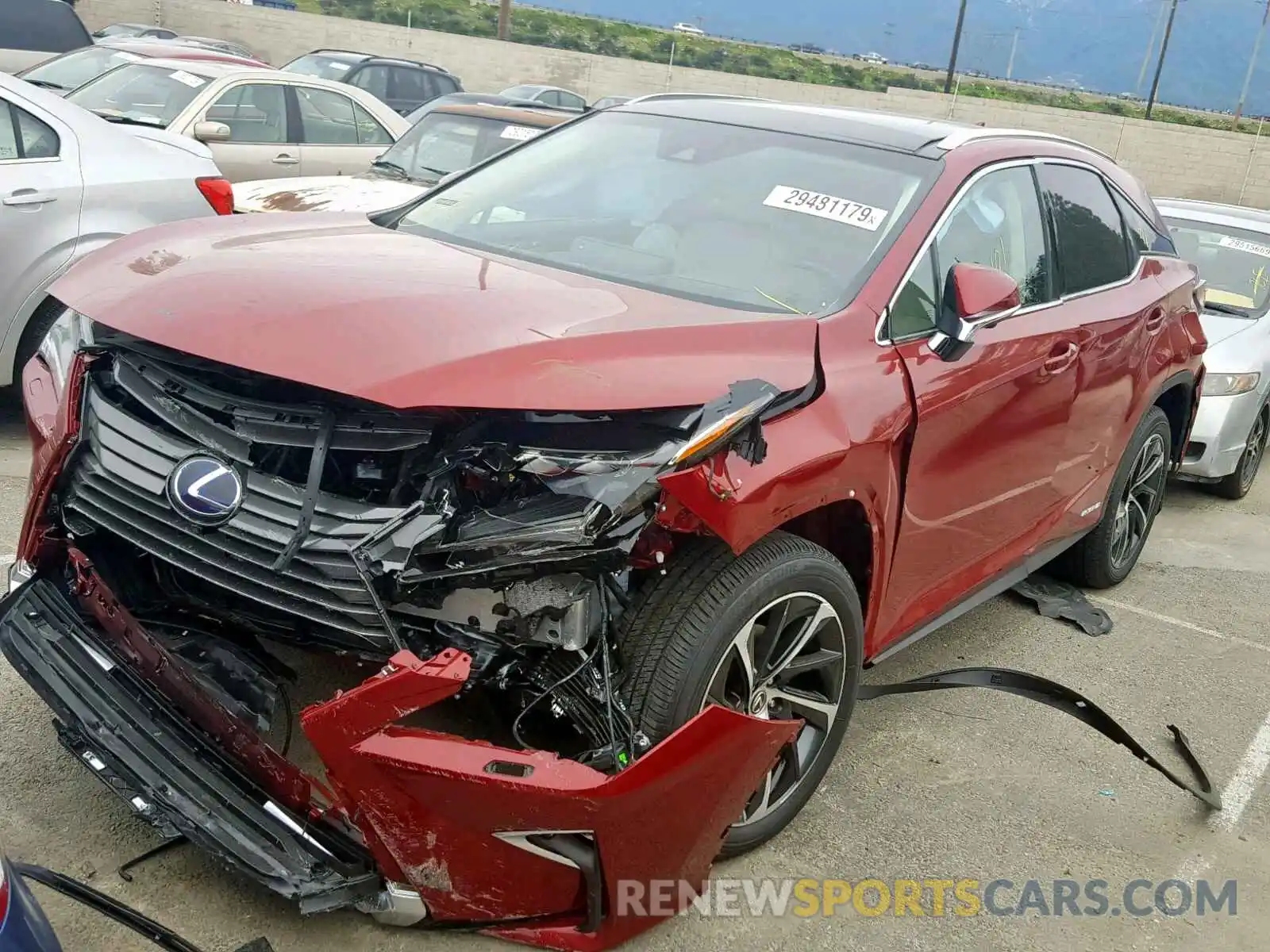 2 Photograph of a damaged car 2T2BGMCA5KC030812 LEXUS RX450 2019