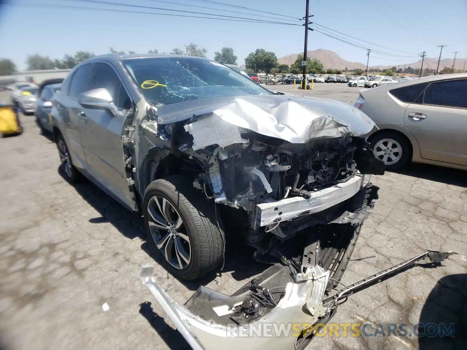 1 Photograph of a damaged car 2T2BGMCA6KC035324 LEXUS RX450 2019