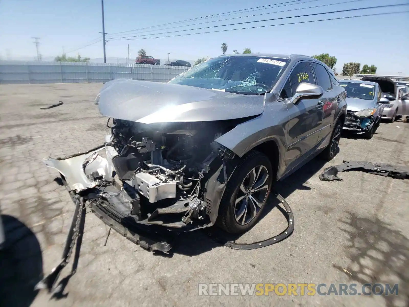 2 Photograph of a damaged car 2T2BGMCA6KC035324 LEXUS RX450 2019