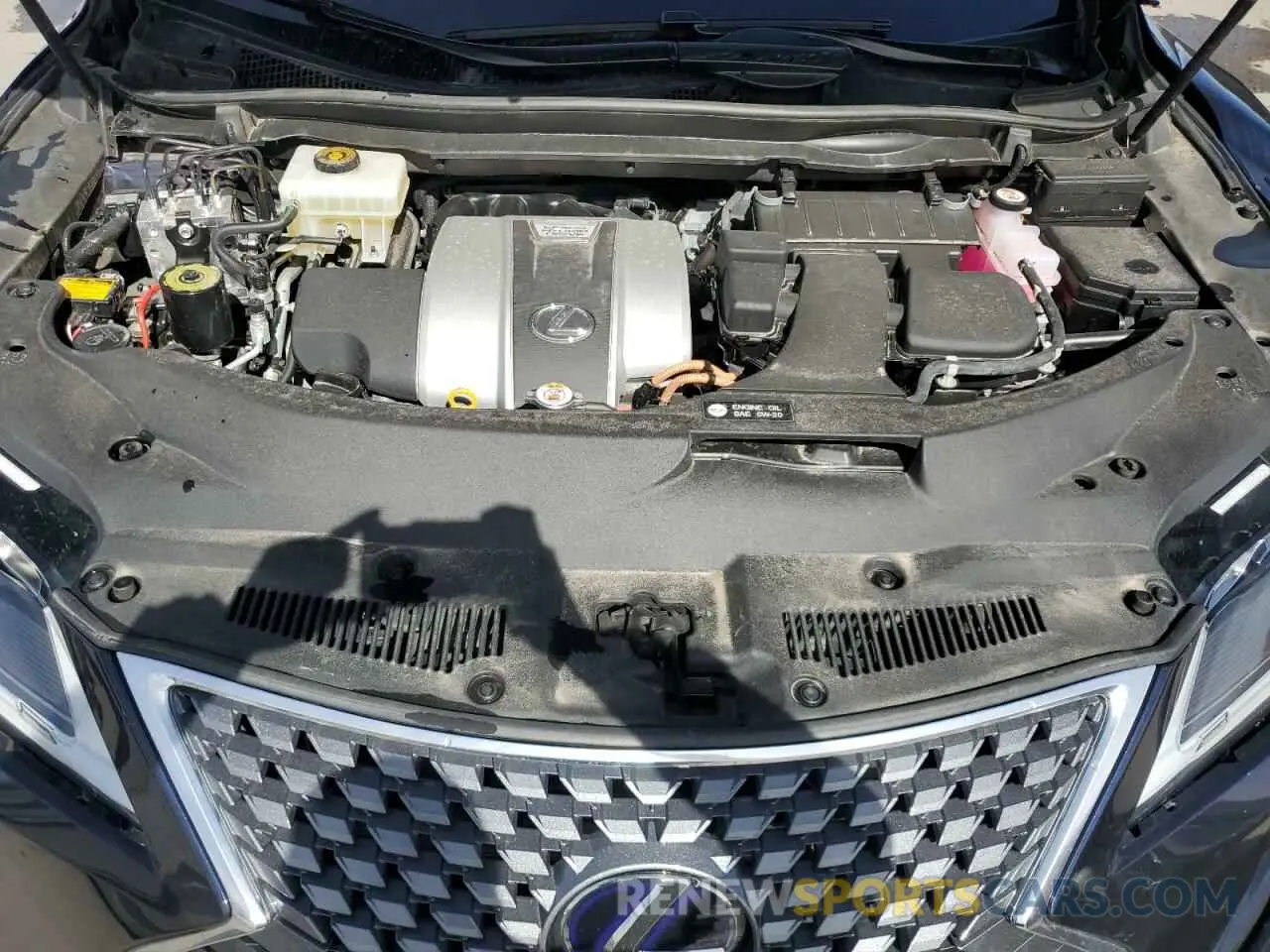 12 Photograph of a damaged car 2T2JGMDA4LC047144 LEXUS RX450 2020
