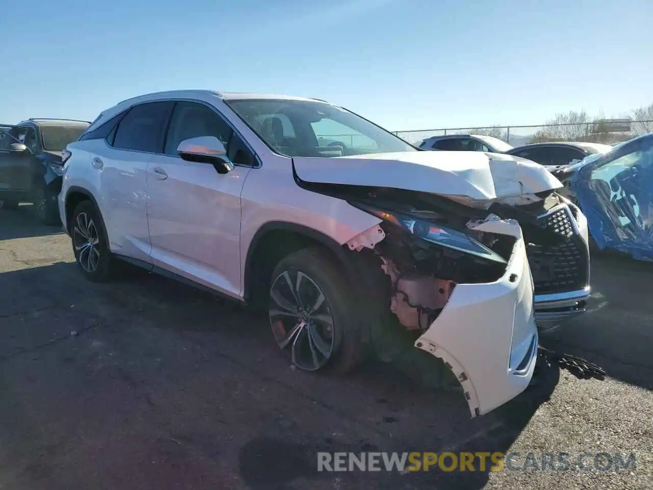 4 Photograph of a damaged car 2T2HGMDA7MC063967 LEXUS RX450 2021