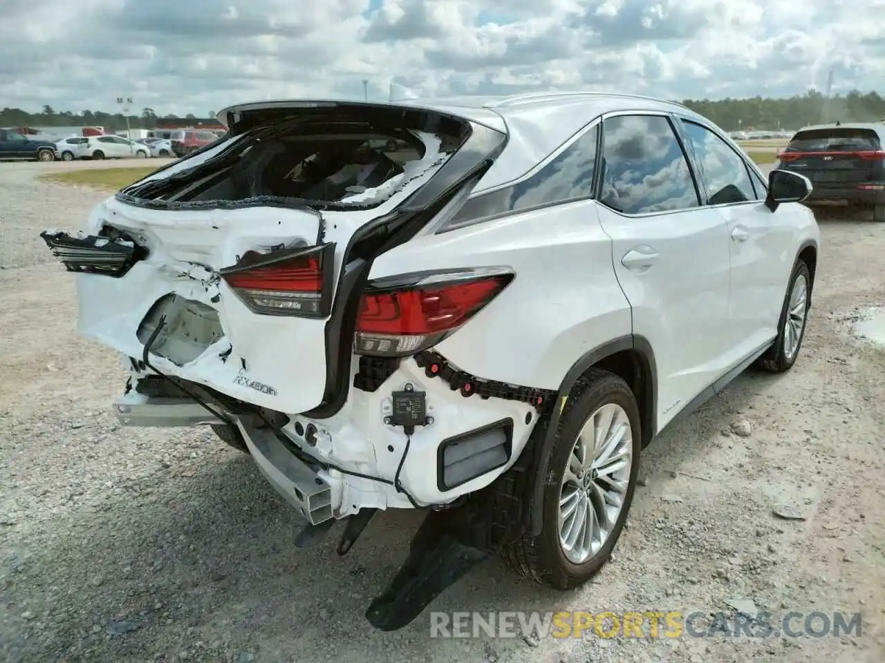 4 Photograph of a damaged car 2T2JGMDA0MC059857 LEXUS RX450 2021