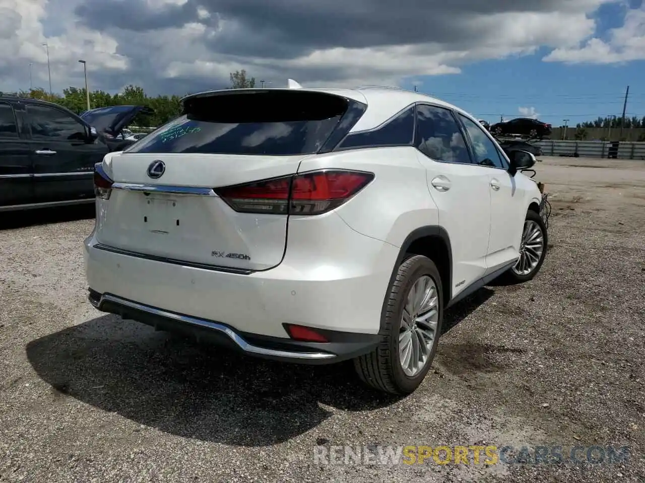 4 Photograph of a damaged car 2T2JGMDA6MC060799 LEXUS RX450 2021