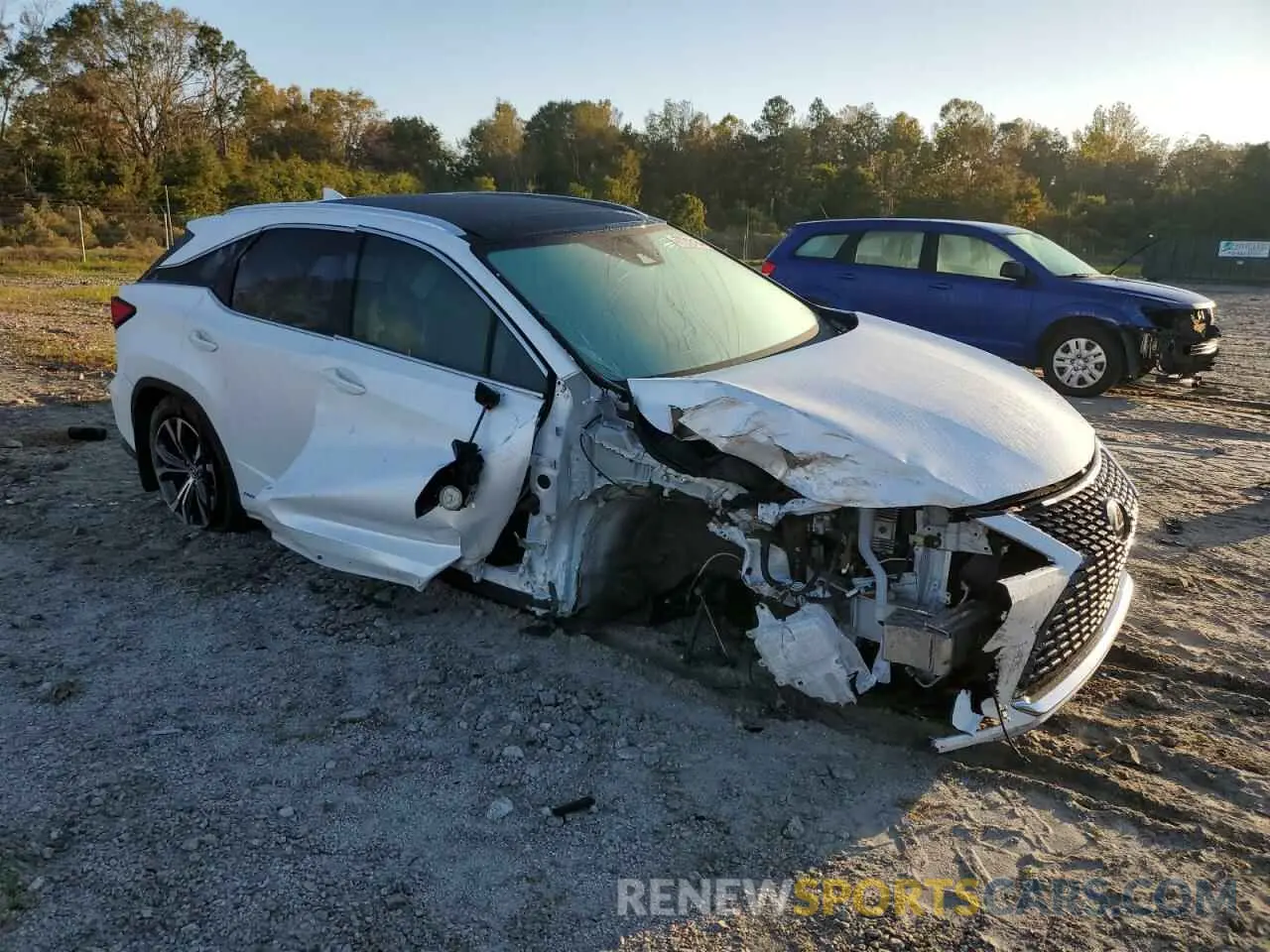 4 Photograph of a damaged car 2T2HGMDA0NC090011 LEXUS RX450 2022