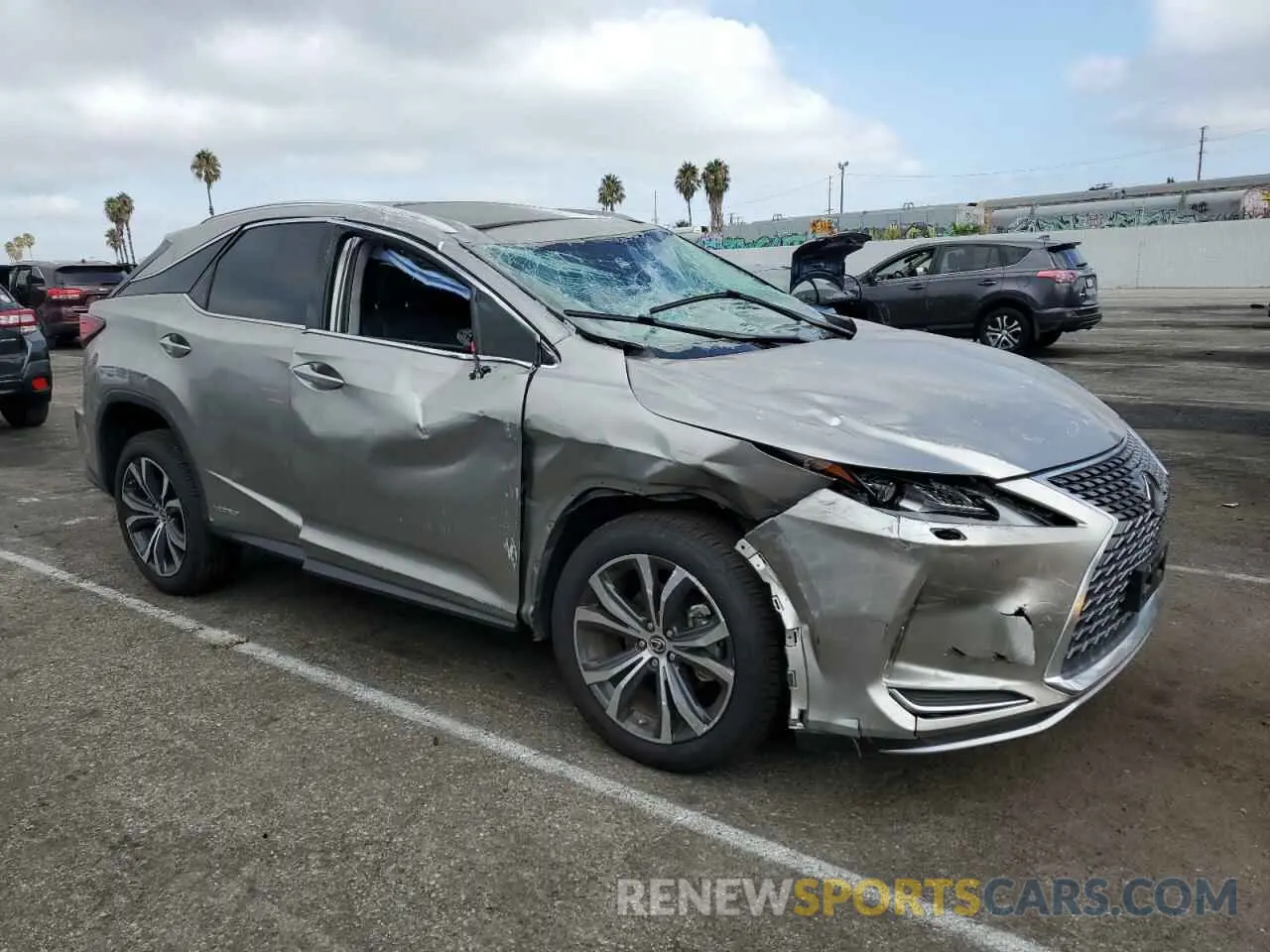 4 Photograph of a damaged car 2T2HGMDA1NC082757 LEXUS RX450 2022