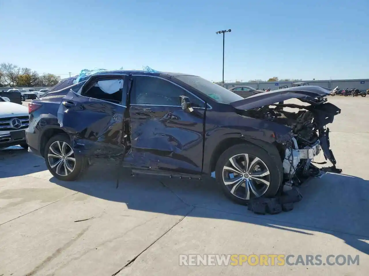 4 Photograph of a damaged car 2T2HGMDA2NC076630 LEXUS RX450 2022