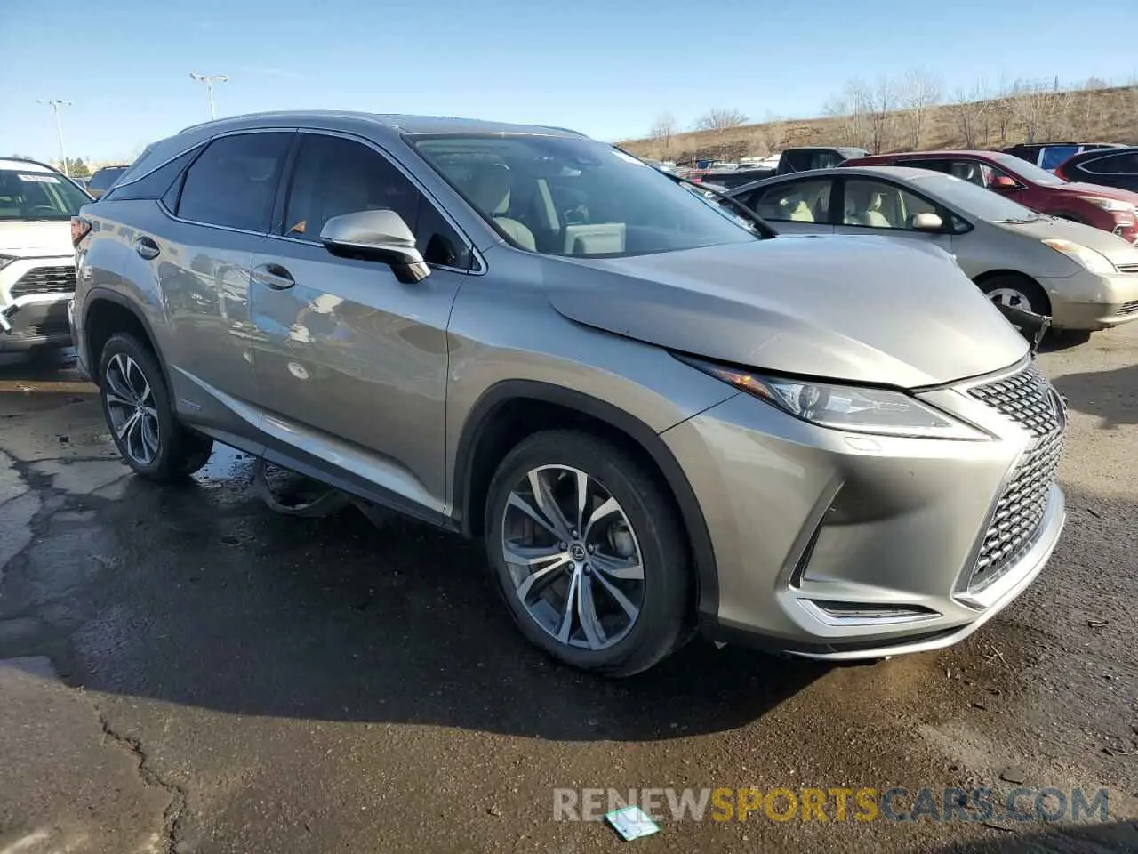 4 Photograph of a damaged car 2T2HGMDA9NC073319 LEXUS RX450 2022